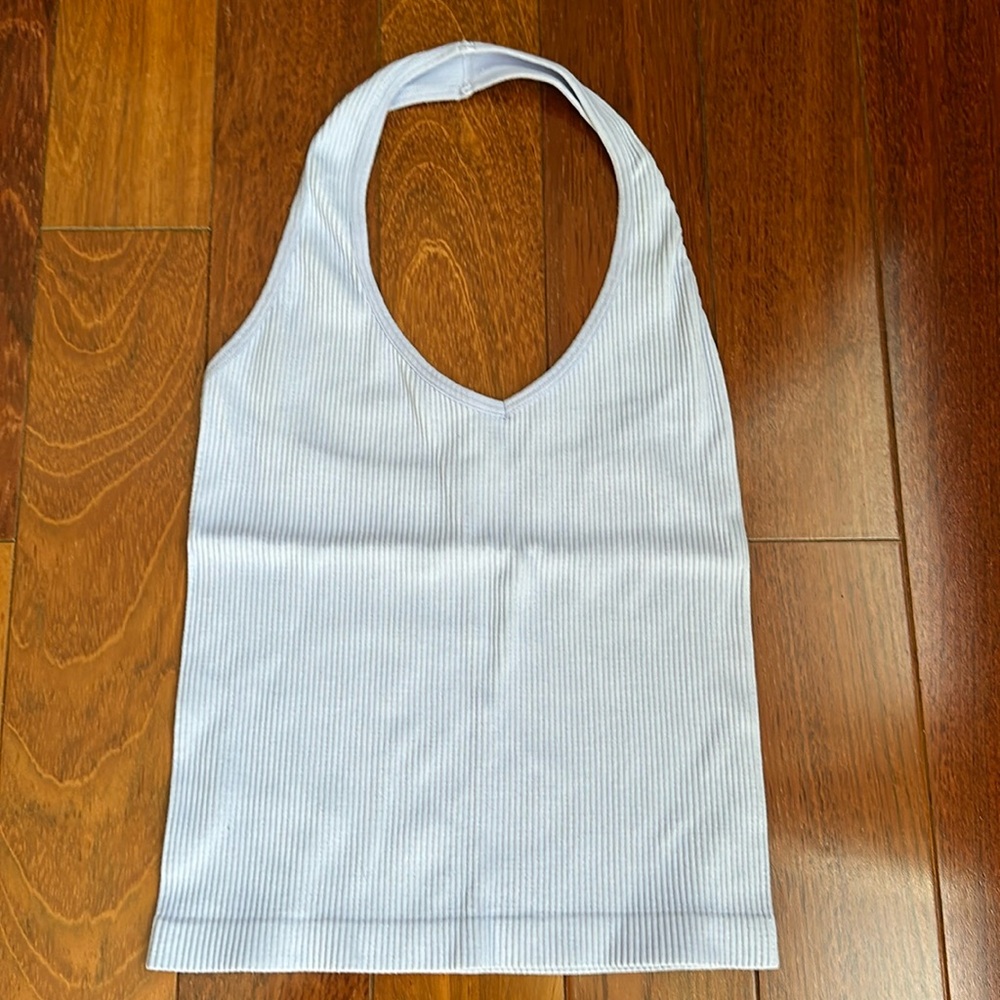 Lilac color halter top. Size O/S. Great condition.